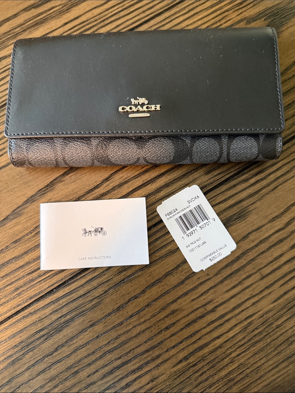 Coach Black Leather and Brown Signature Canvas Trifold Wallet